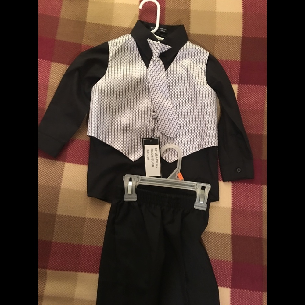 New with tags...Andrew Fezza four piece suit